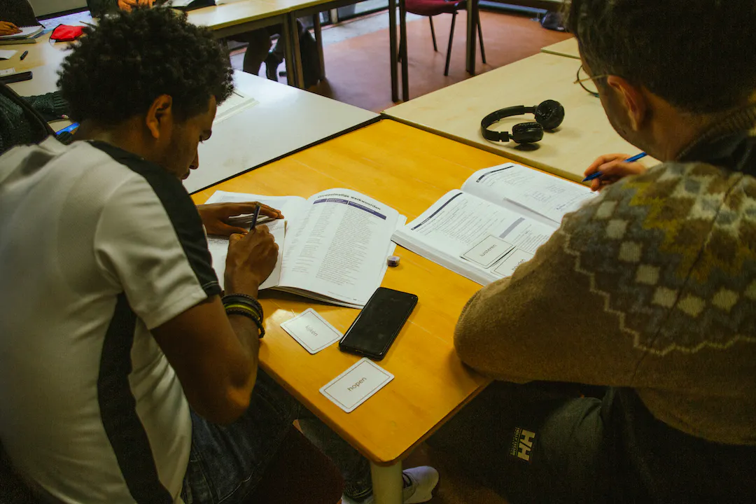 Students learn Dutch language during free classes at BOOST Amsterdam