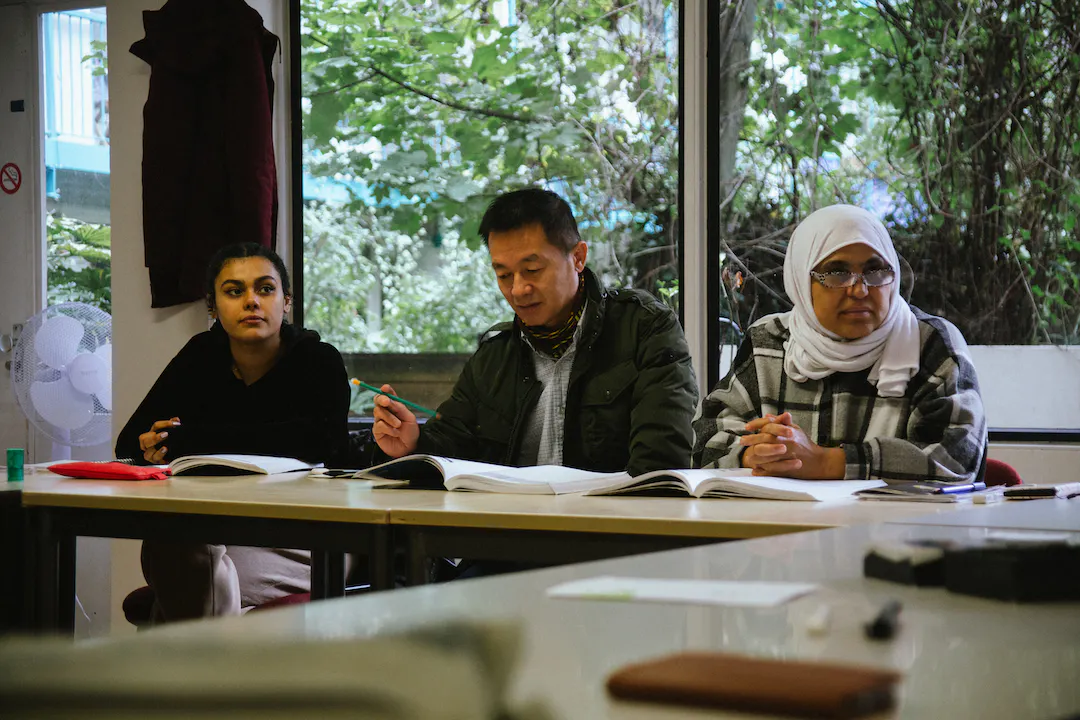 three people learn Dutch during free language course at BOOST Amsterdam